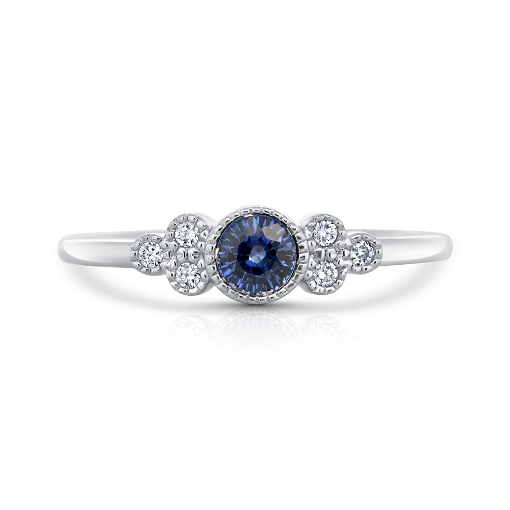 View Sapphire and Diamond Bezel Set Ring