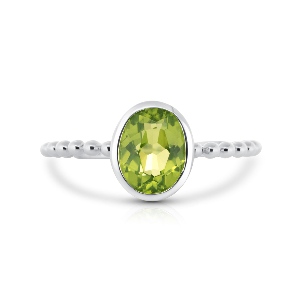 View Oval Peridot Bezel Set With Beaded Shank Ring